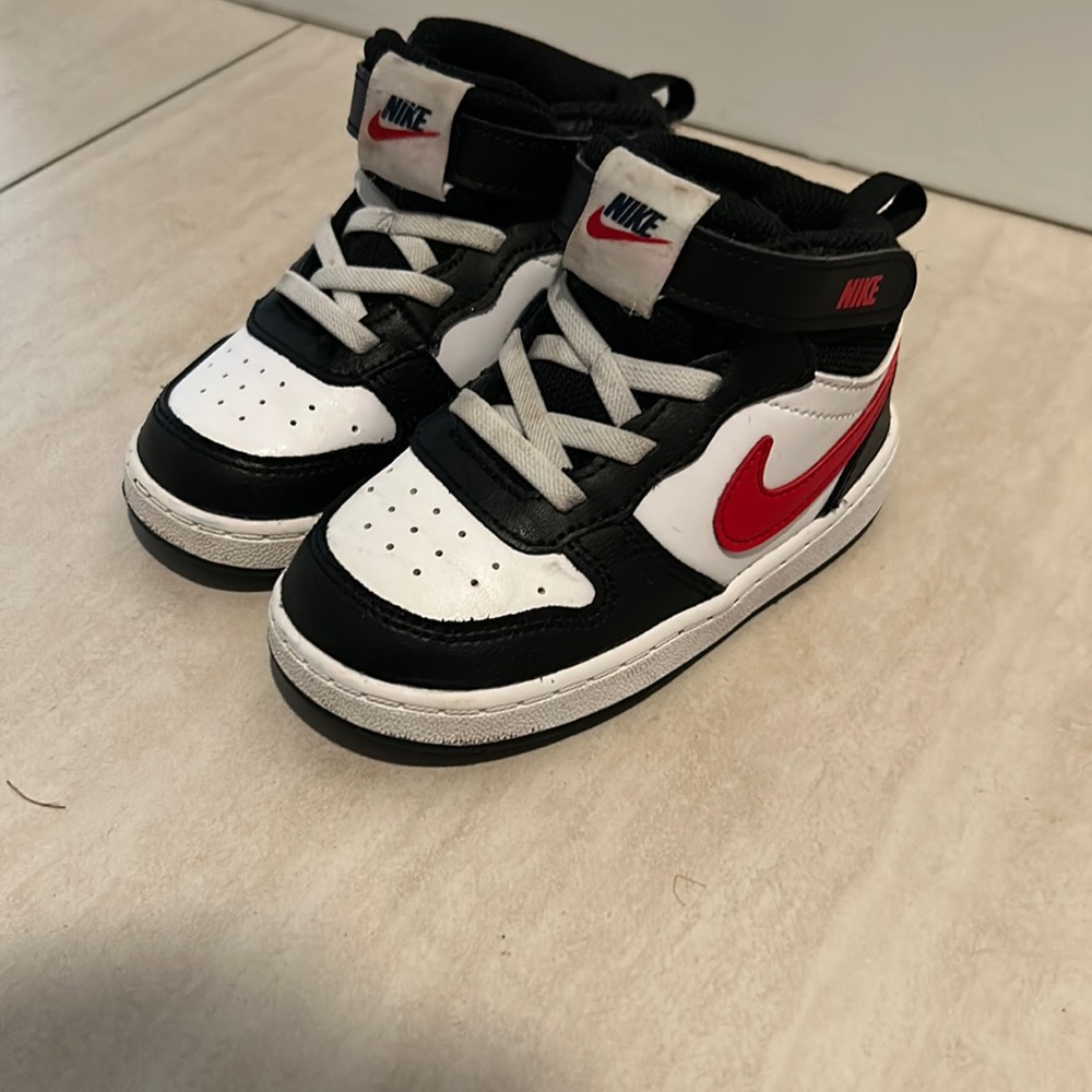 Nike toddler shoes, red blue, black, and white